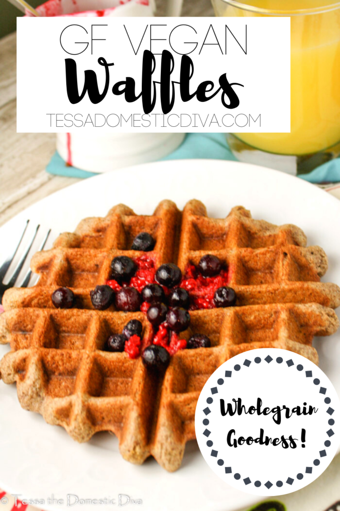 pinterest ready white plate with a golden gluten free vegan waffle topped with fresh berries