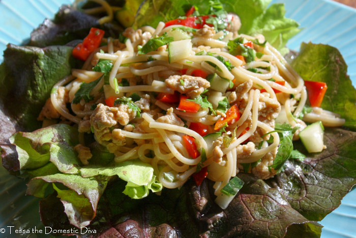 overhead view of asian lettuce wraps on a blue plate