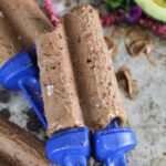 several fudgesicles arranged on a cookie sheet from overhead