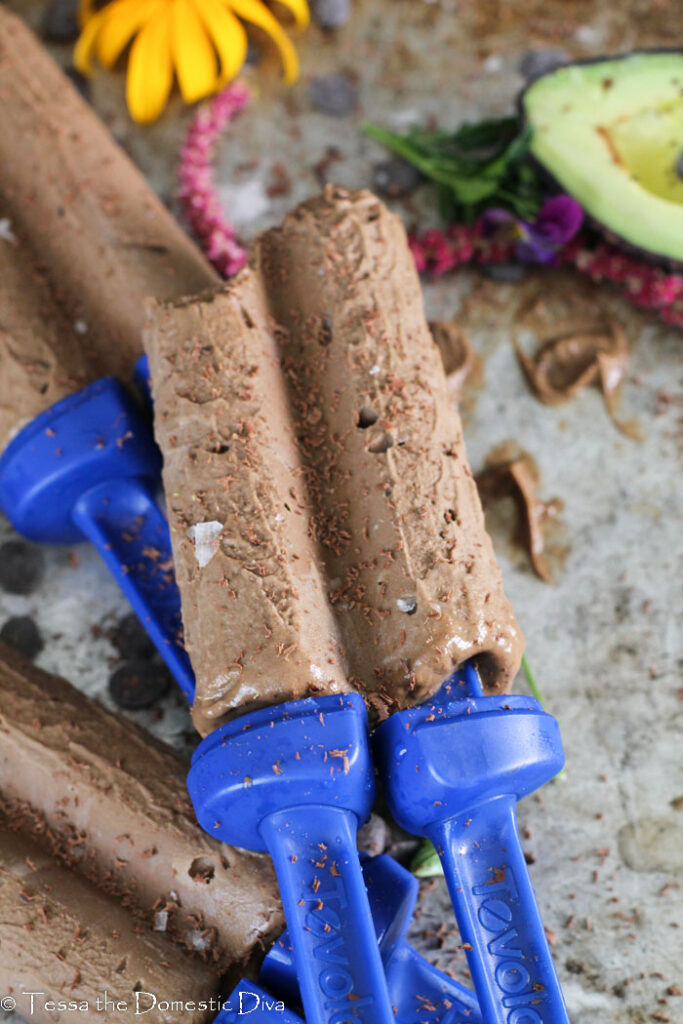 several fudgesicles arranged on a cookie sheet from overhead