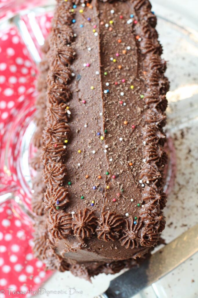 overhead view of rectangle chocolate cake with chocolate frosting.