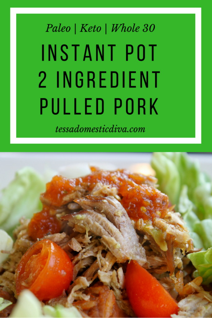 optimized for pinterest instant pot pulled pork for tacos close up on a bed of lettuce with halved cherry tomatoes