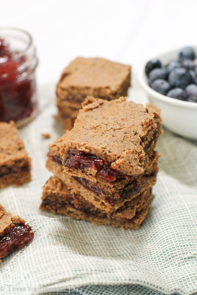 gluten free cereal bars with fruit filling on a linen cloth