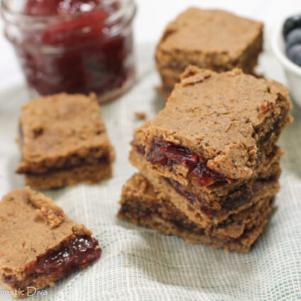 several gluten free breakfast bars arranged on white surface