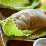 close up of one veggie salad roll wrapped in rice paper