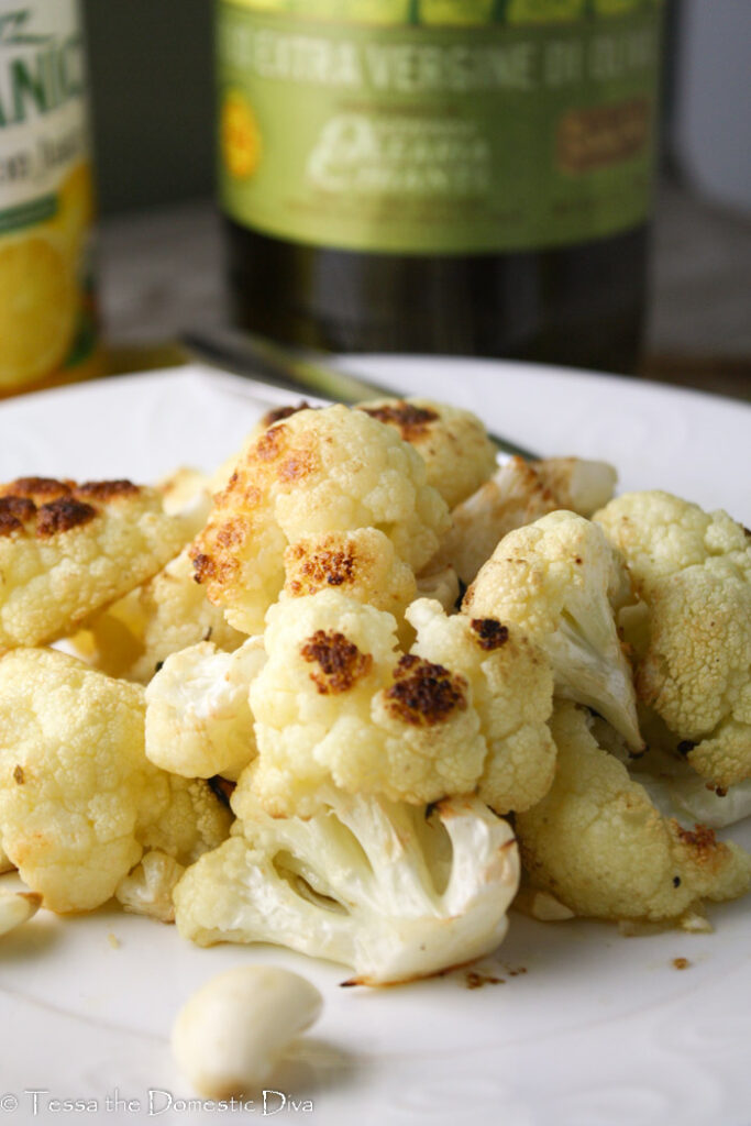 a white plate with roasted cauliflower.