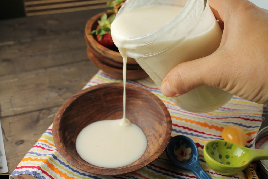 horizontal image of freshly made pourable coconut butter