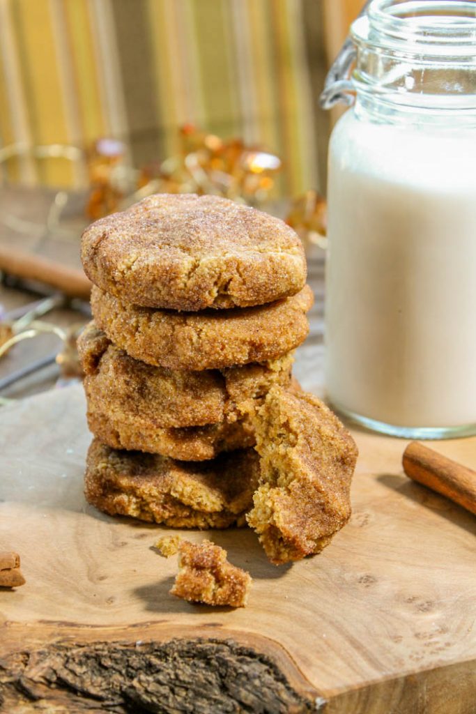 stack of five pumpkin snickerdoodles cookies with a vintage milk container