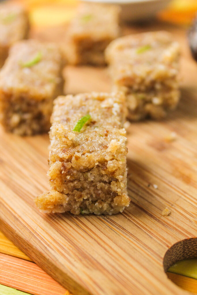 no bake rectangle shaped energy bars of lime, coconut, and hemp bar close up.