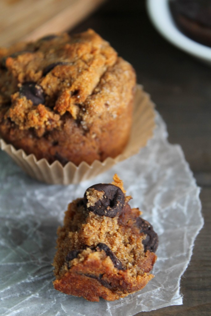 a chocolate studded sweet potato muffin piece arranged on white parchment paper