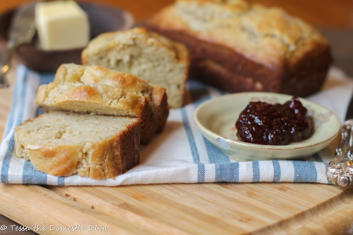 eye level close up of sliced low carb bread with butter and berry spread