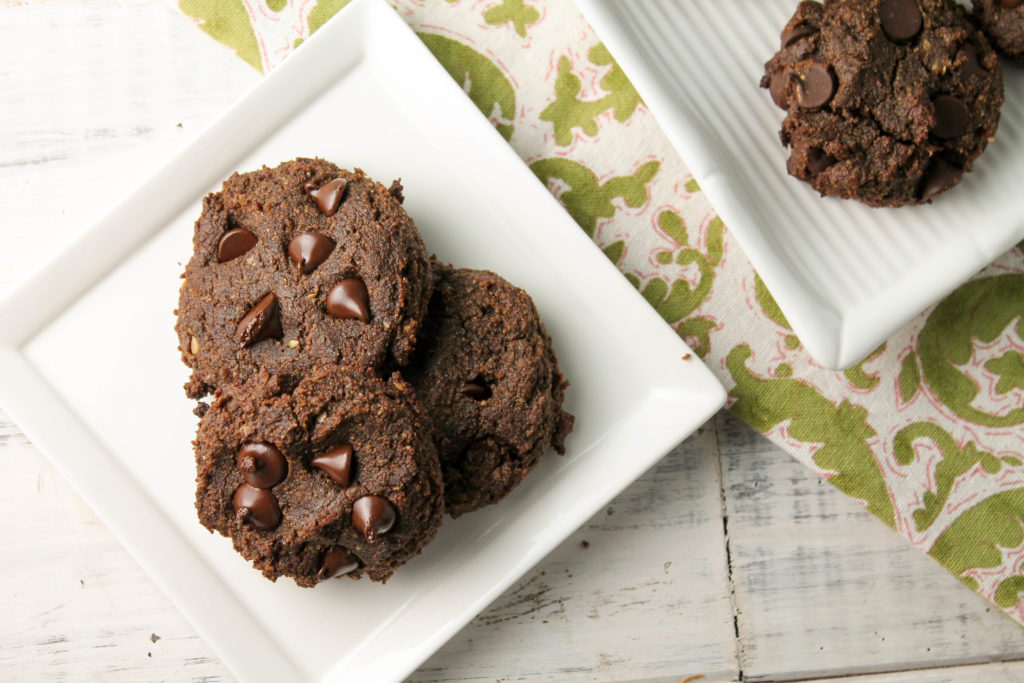 birdseye view of a gluten free double chocolate chip cookies on a white plate.