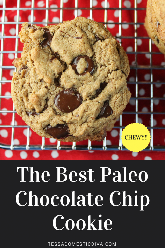 optimized for pinterest best apleo chococlate chip cookie with chewy texture on a metal cooling rack and red with white polka dot background