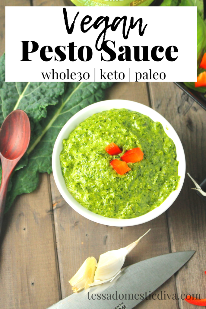 pinterest ready white bowl filled with a vibrant green basil pesto garnished with red pepper pieces