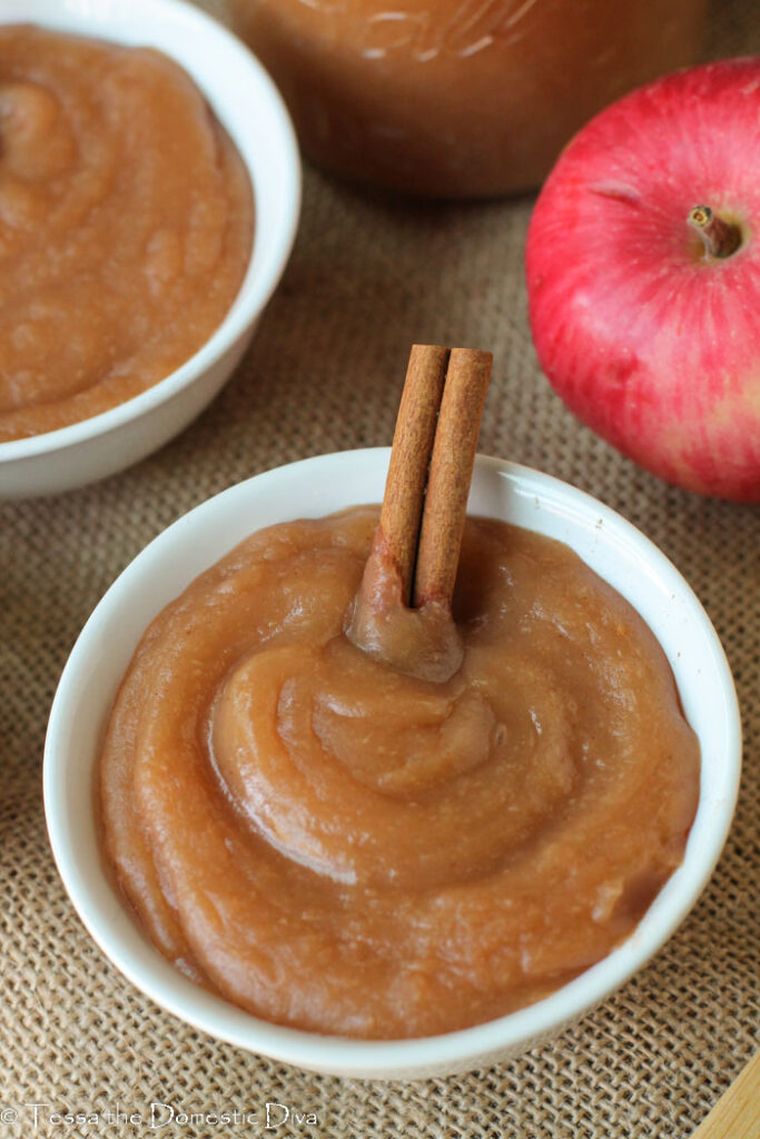 instant pot applesauce with peels in two white bowls