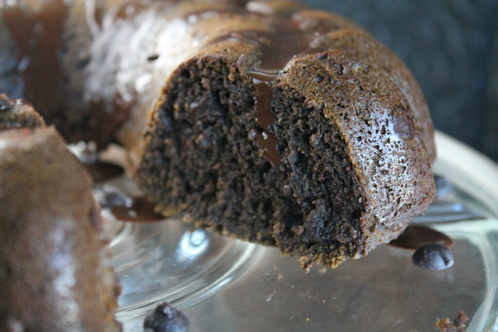 close up of sliced chocolate bundt cake closeup for texture 