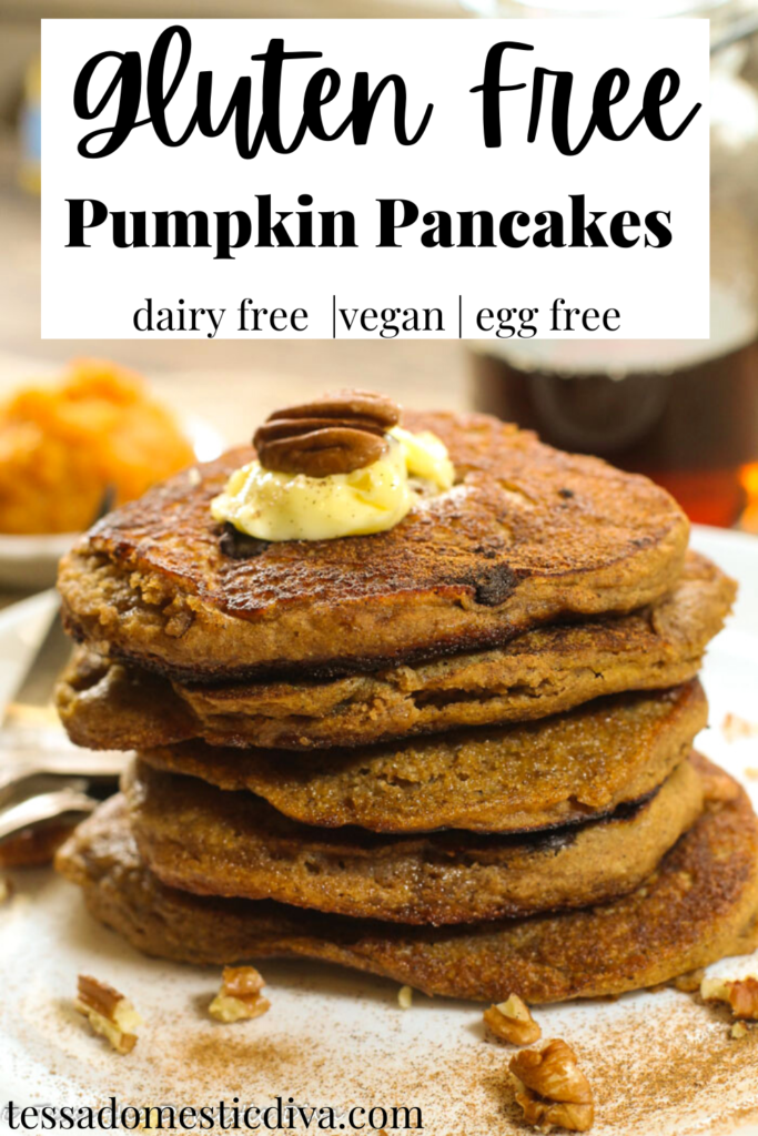 pinterest ready stack of pumpkin pancakes on a white plate with pecan and butter garnish