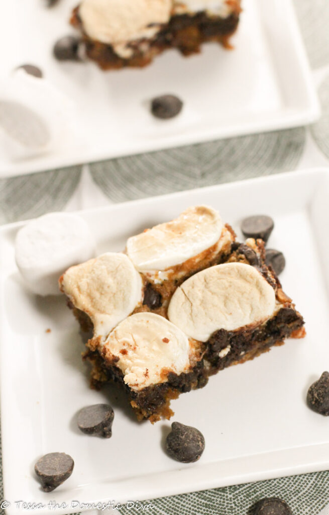 two squares of blondies with marshmallows