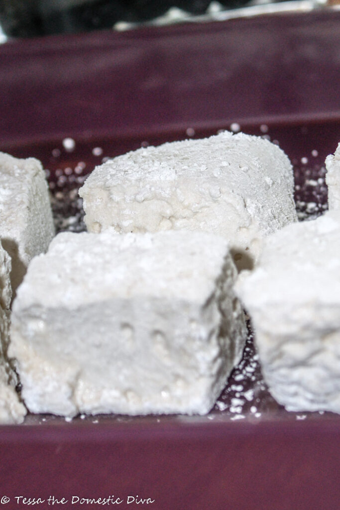 close up of homemade marshmallows in a purple serving dish