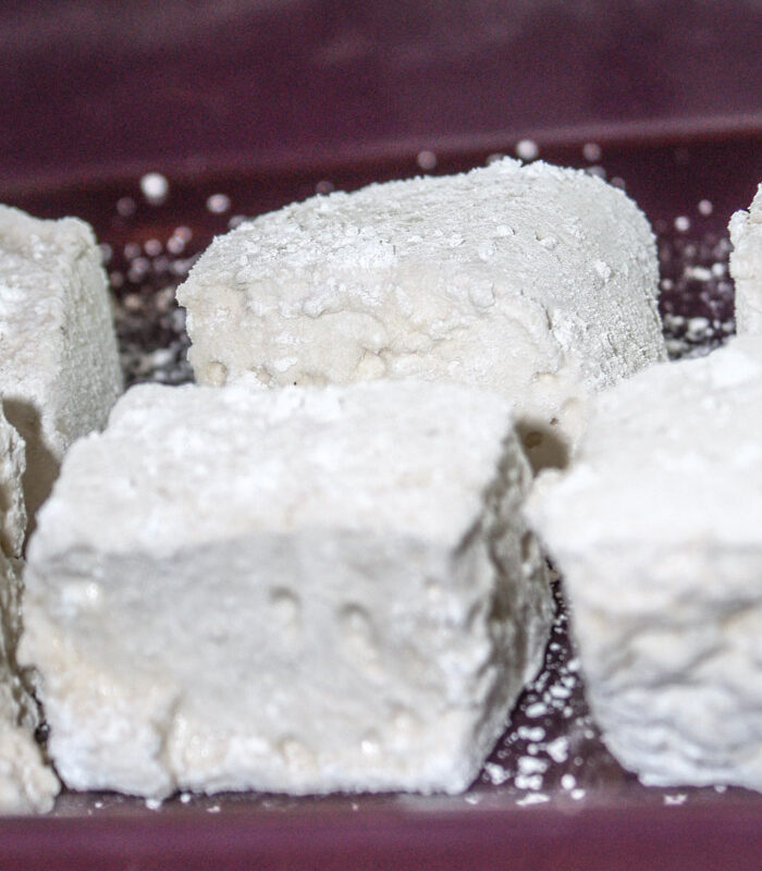 close up of homemade marshmallows in a purple serving dish